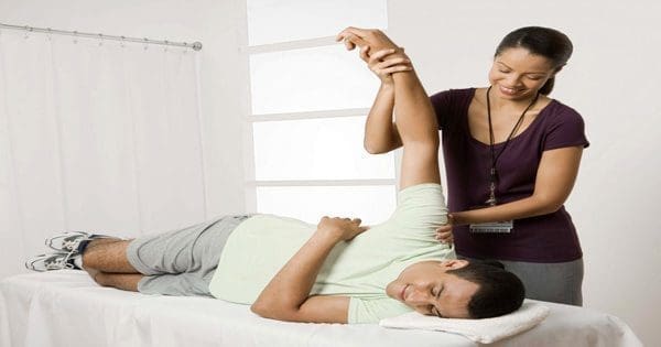 blog picture of chiropractor adjusting patient