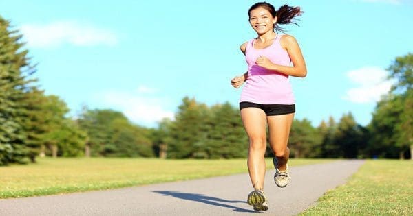 blog picture of young female jogging on park path
