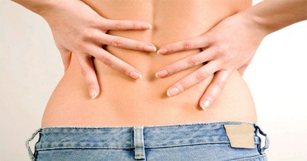 blog picture of lady with lower back pain