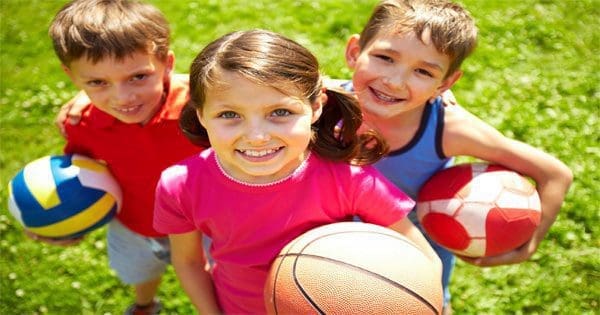 blog picture of three kids with soccer balls