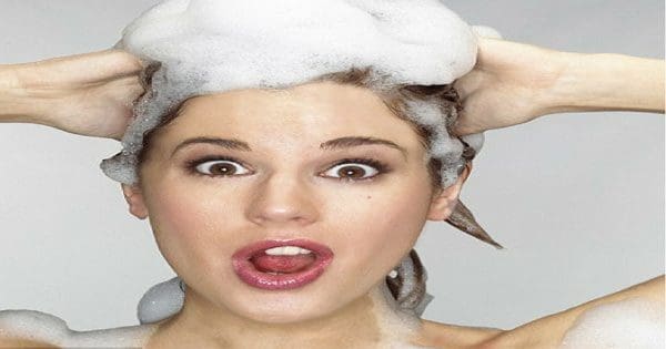 blog picture of lady shampooing and smiling
