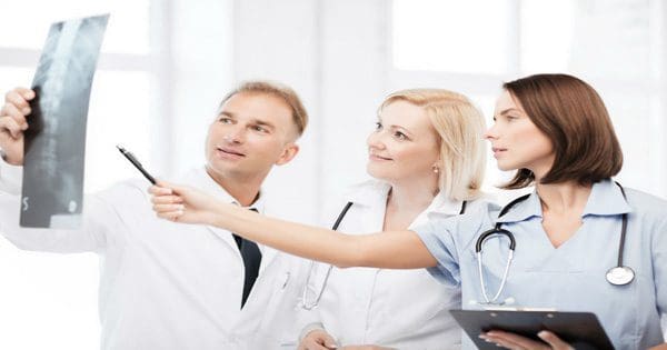 Group of doctors looking at rays